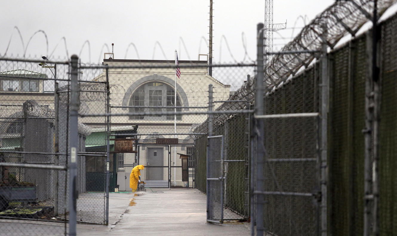 Shelved report details 14 COVID deaths inside Washington prisons