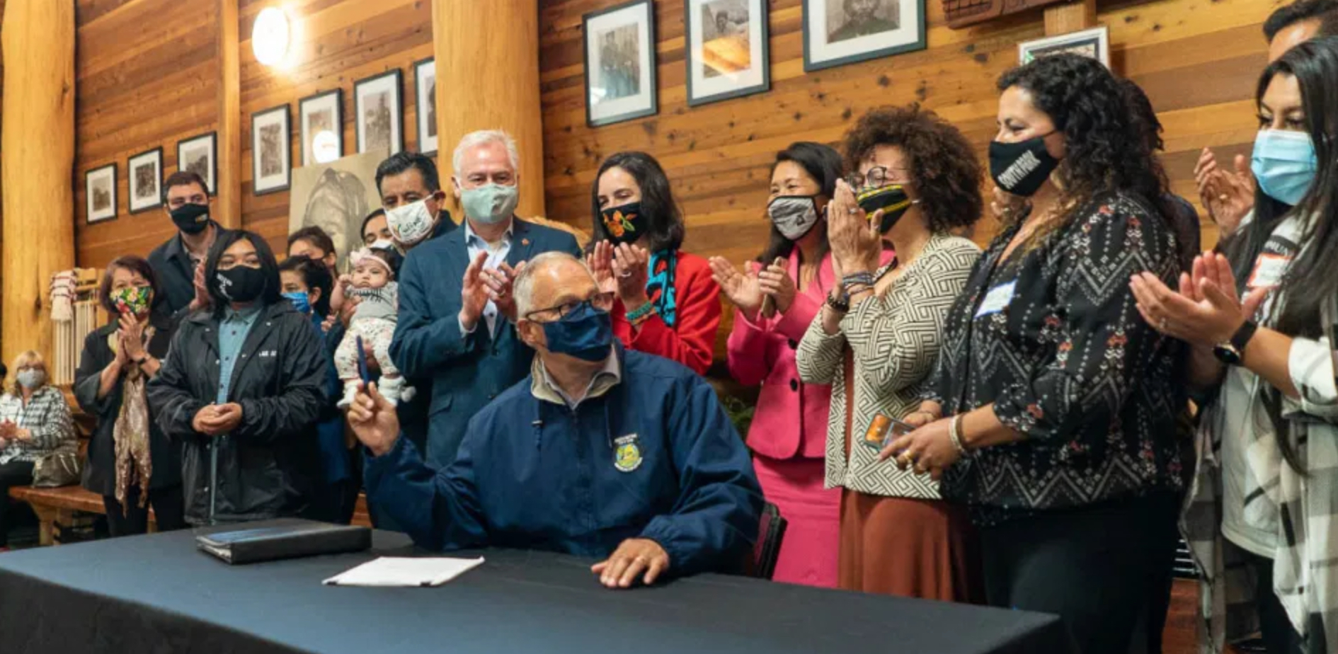 At the Duwamish longhouse, a law is signed requiring environmental justice from state agencies